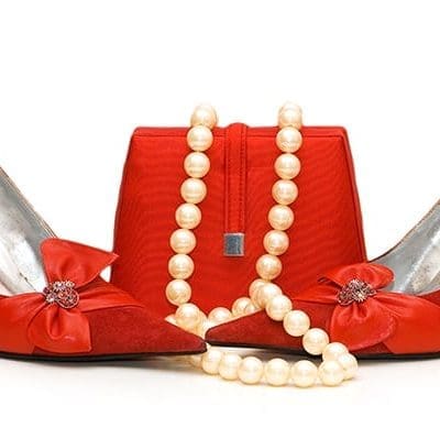 Bold Red stilettos and purse with Pearl Neckless